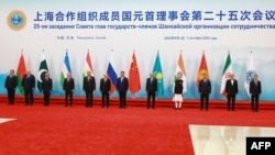 Leaders of SCO member states pose on the sidelines of the bloc's summit in Tianjin, China, on September 1.