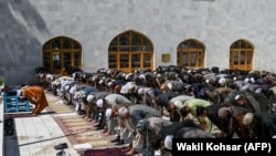 Friday Prayers on the first day of the holy month of Ramadan at Pul-e Khishti mosque in Kabul.