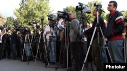 Armenia -- Television cameramen at an opposition rally in Yerevan in 2011.