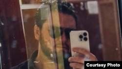 Tajik security officers "checked his mobile phone and found several videos with religious content,” a friend of Saidazam Rahmonov told RFE/RL.