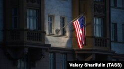 The U.S. flag flies outside the U.S. Embassy on Novinsky Boulevard in central Moscow in 2021. The United States has repeatedly warned its citizens to leave Russia. 
