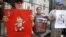 UKRAINE – Activists holds posters with images of Ukrainian film director Oleh Sentsov, during a rally in support of Sentsov and other Ukrainian political prisoners jailed in Russia, in front of the Russian embassy in Kyiv, 13 June 2018UKRAINE –Activists h