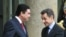 Fransiýanyň prezidenti Nikolas Sarkozy (sagda) we Türkmenistanyň prezidenti Gurbanguly Berdimuhamedow (çepde) günortanlyk naharynyň öňüsyrasynda, 1-nji fewral, 2010-njy ýyl.