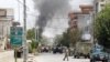 Smoke rises from an area where explosions and gunshots were heard in Jalalabad on July 28.