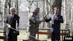 Presidents Dmitry Medvedev of Russia and Serzh Sarkisian of Armenia fish during their informal meeting in Zavidovo, Russia on April 23, 2009.