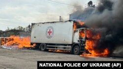 Red Cross employees had been bringing fuel briquettes to residents of the war-torn Donetsk region when the attack occurred. 