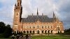 NETHERLANDS -- People walk toward the International Court of Justice in the Hague, August 27, 2018