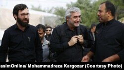 ابراهیم حاتمی‌کیا (وسط) و احسان محمد حسنی (چپ) رئیس سازمان اوج