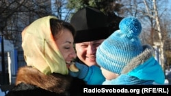 Супруги Бойко с сыном Владимиром. Киев, 5 марта 2013 года.