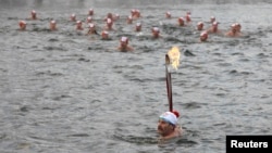 Красноярскида Олимпия уеннары уты 26 ноябрь көнне Енийсей елгасы буйлап йөзеп тә барды