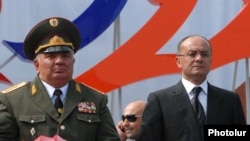 Armenia - Defense Minister Seyran Ohanian (R) and Yuri Khachaturov, chief of the Armenian army's General Staff, watch a military parade in Yerevan, 21Sept2011.