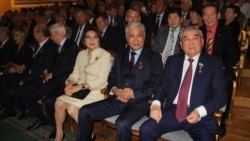 Суретте (алдыңғы қатарда оңнан солға қарай): Қуаныш Сұлтанов, Иманғали Тасмағамбетов және Бірғаным Әйтімова комсомолдың 100 жылдығына арналған салтанатты жиында отыр. Алматы, 20 қазан 2018 жыл.