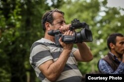 Elcan Məmmədov film çəkilişi zamanı.