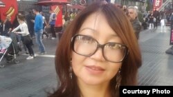 Сания Тойкен.