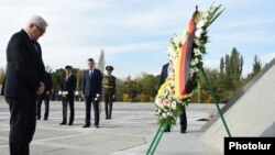 Armenia - German Foreign Minister Frank-Walter Steinmeier lays a wreathe at the Armenian genocide memorial in Yerevan, 23Oct2014.