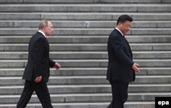 Си Цзиньпин и Владимир Путин в Пекине 25 июня