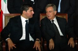 در کنار بهاءالدین حریری در مراسم یادبود پدرس رفیق حریری در فوریه ۲۰۰۵