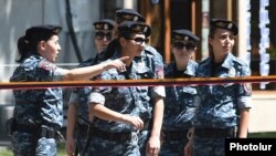 Armenia - Riot police officers are deployed at a street section in Yerevan close to a police staton seized by opposition gunmen, 27Jul2016.