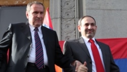 Armenia - Former President Levon Ter-Petrosian (L) and Nikol Pashinian greet supporters in Yerevan's Liberty Square, 31 May 2011.