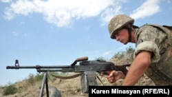 Nagorno-Karabakh -- An Armenian soldier on frontline duty in northeastern Karabakh, 20Jul2012