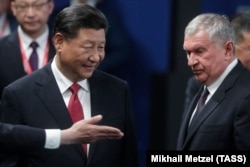 Председатель Китайской Народной Республики Си Цзиньпин и Игорь Сечин