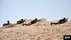 Сирия аскерлери Палмираны коргоп жаткан учур. 17-май, 2015-жыл.