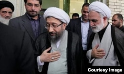 محسنی اژه‌ای (راست) در کنار صادق لاریجانی رئیس اسبق دستگاه قضایی