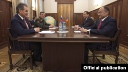 Russia - Defense Minister Sergey Shoygu (L) meets his Armenian counterpart Seyran Ohanian in Moscow, 19Dec2012.