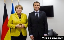 Ангела Меркэль і Эмануэль Макрон