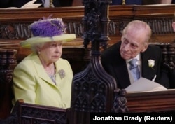 Британ канышасы Элизабет II жана күйөөсү, канзаада Филипп. 2018-жылдын 19-майы.