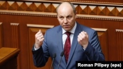 Andriy Parubiy addresses lawmakers during a session of parliament in April 2016.