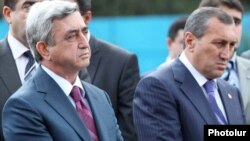 Armenia - President Serzh Sarkisian (L) and Surik Khachatrian, governor of Syunik province, attend an official ceremony, where?, undated