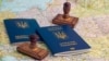Ukraine -- Ukrainian foreign passports, stamps and map of Europe, Kyiv, 2016