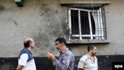 Жардыруу болгон кафенин терезеси.