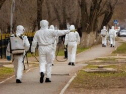 Дезинфекция городских улиц во время пандемии коронавируса. Иллюстративное фото.