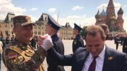 Russia -- Armenian Defense Minister Davit Tonoyan (R) greets Colonel Ashot Hakobian who led Armenian soldiers that marched through Red Square in a Russian miliary parade, Moscow, June 24, 2020.