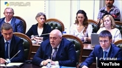 Директор Київського науково-дослідного інституту судових експертиз Олександр Рувін (у центрі)