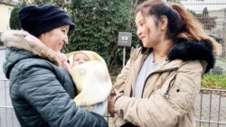 Хосият Ёрова с четырехмесячным ребенком в Германии