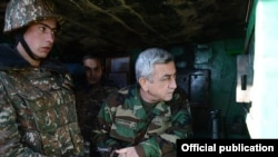Armenia - President Serzh Sarkisian inspects an Armenian army post on the border with Azerbaijan, 31Dec2013.