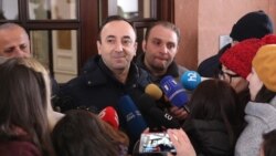 Armenia -- Constitutional Court Chairman Hrayr Tovmasian talks to reporters outside his home searched by law-enforcement officers, Yerevan, January 24, 2020.