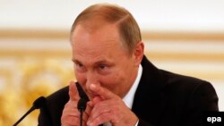 Президент России Владимир Путин во время выступления перед призерами Олимпийских игр.