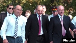 Nagorno-Karabakh -- Armenian President Robert Kocharian (L), newly inaugurated Karabakh President Bako Sahakian (C) and his predecessor Arkadi Ghukasian walk in Stepanakert, September 7, 2007.
