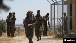 Сирия Демократиялык күчтөрүнүн аскерлери. Алеппо провинциясы, 13-июнь, 2016-жыл.