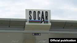 Әзербайжанның SOCAR мемлекеттік мұнай компаниясының белгісі.  