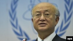 یوکیو آمانو، مدیر کل آژانس بین‌المللی انرژی اتمی (در تصویر) برای پاسخ به پرسش‌های نمایندگان کنگره آمریکا، در میانه مرداد ماه به واشینگتن رفته بود