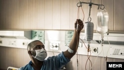 Iran -- A patient in a hospital in Tehran, undated.