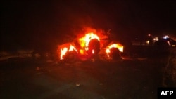 Белгисиз согушкерлер Израилдин Керем Шалом чек ара бекетинде жардырган унаа. 5-август, 2012-жыл. 