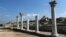The ruins of an ancient basilica (foreground) and the St. Vladimir Cathedral (background) are seen at the Tauric Chersonesos preserve in Sevastopol in 2017.