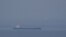 Ships carrying Ukrainian grain are seen in the Black Sea near the Ukrainian port of Odesa.