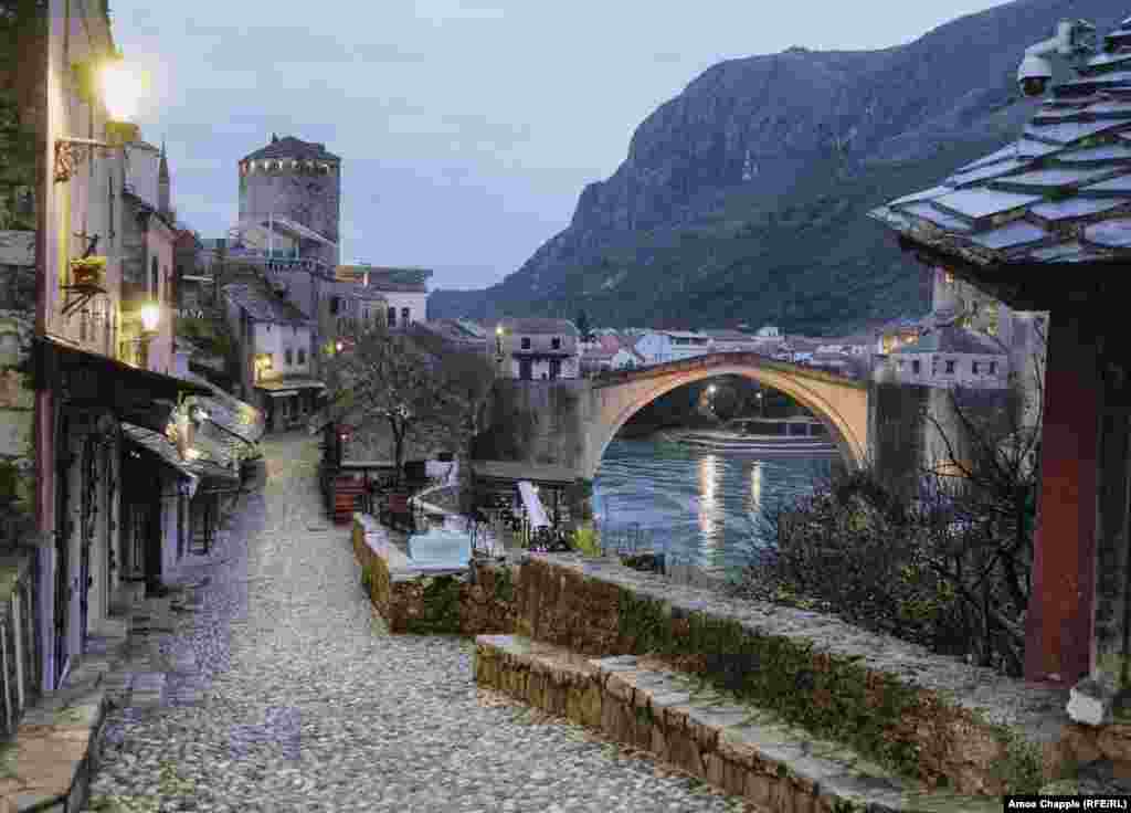 An empty tourist area next to Mostar&rsquo;s famous bridge. &nbsp; Enisa Basic, who runs a historic cafe next to the bridge, told RFE/RL her business employed 10 staff last year when it was thriving. She says the lack of tourism due to the pandemic has forced her to fire all of them. She is cautiously optimistic that the winners of the upcoming elections will help businesses like hers survive: &ldquo;This is a very good city, but the people who have run it just put the money in their own pockets. They don&rsquo;t care about regular people like me. After the elections, we hope things will change for the better.&rdquo; &nbsp; &nbsp;